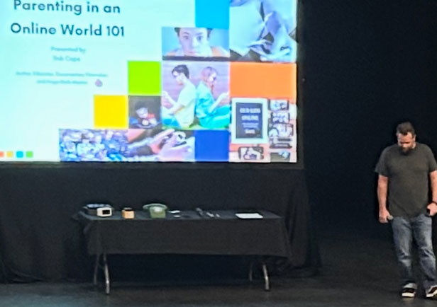 Rob Cope on stage Our Kids Online Wānaka